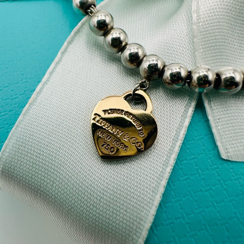 Return to Tiffany & Co. 4 mm Heart Tag Bead Bracelet in Silver & Rose Gold - Picture 5 of 14